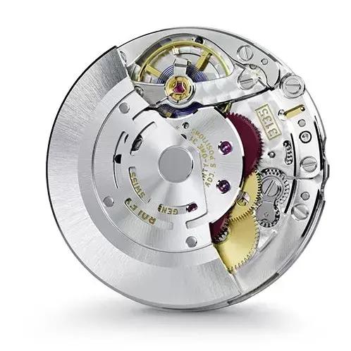 Close-up view of the Rolex Caliber 3135 automatic movement, showcasing gears, rotor, jewels, and intricate finishing inside a silver metal movement.