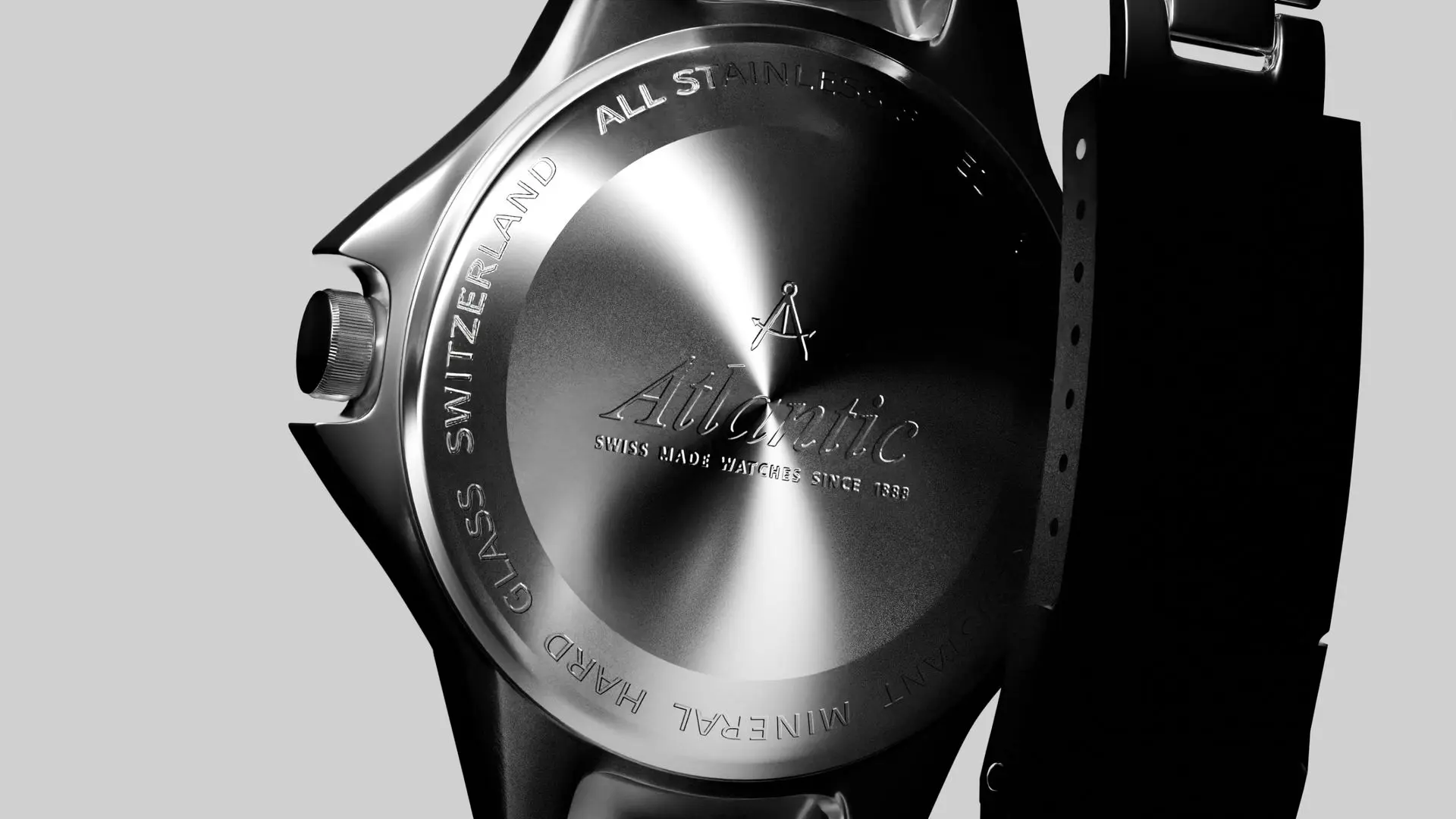  close-up of a solid metal caseback on a rugged dive/sport watch, emphasizing strength, moisture resistance, and a classic, clean appearance.