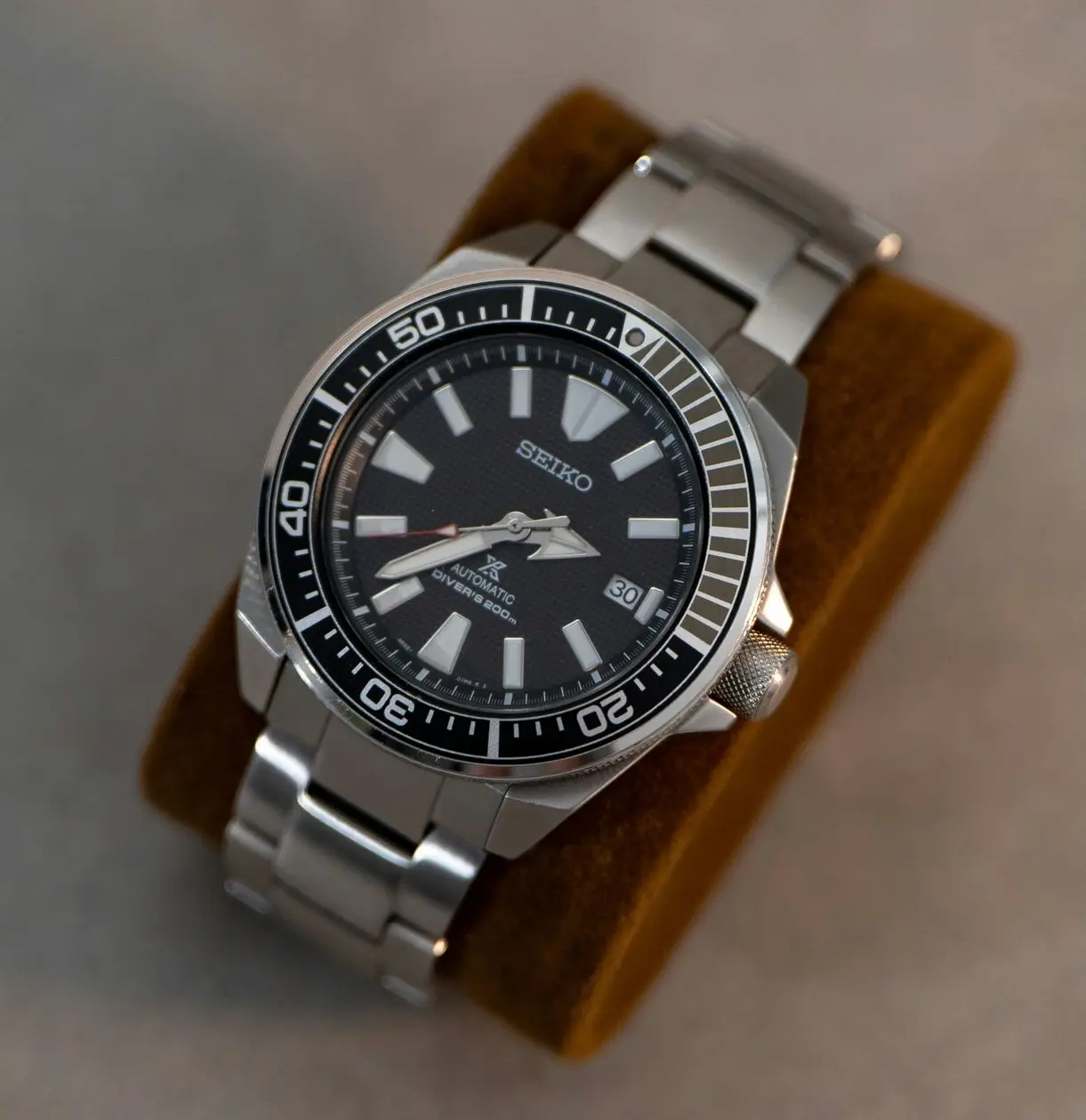 Silent Tick Watch – Seiko Automatic Diver Seiko automatic diver’s watch with a silent sweeping tick displayed on a cushion