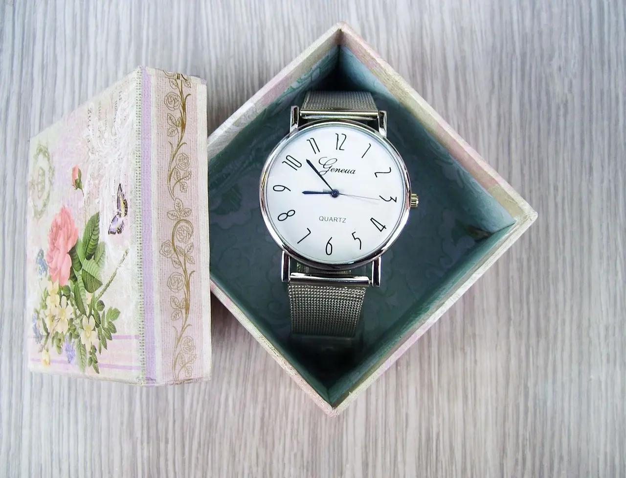 Elegant quartz wristwatch in a floral gift box, symbolizing the beginning of a watch collection journey.