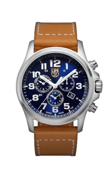 Luminox chronograph watch with blue dial, stainless steel case, and brown leather strap