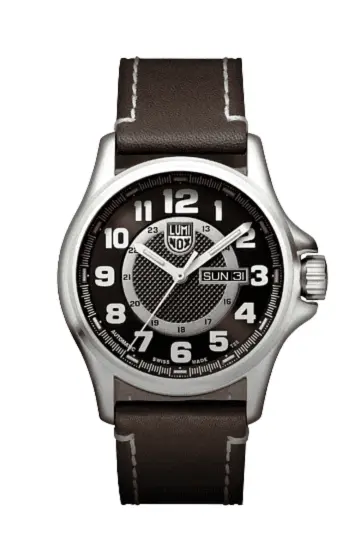 Luminox watch with stainless steel case, black dial, white numerals and brown leather strap