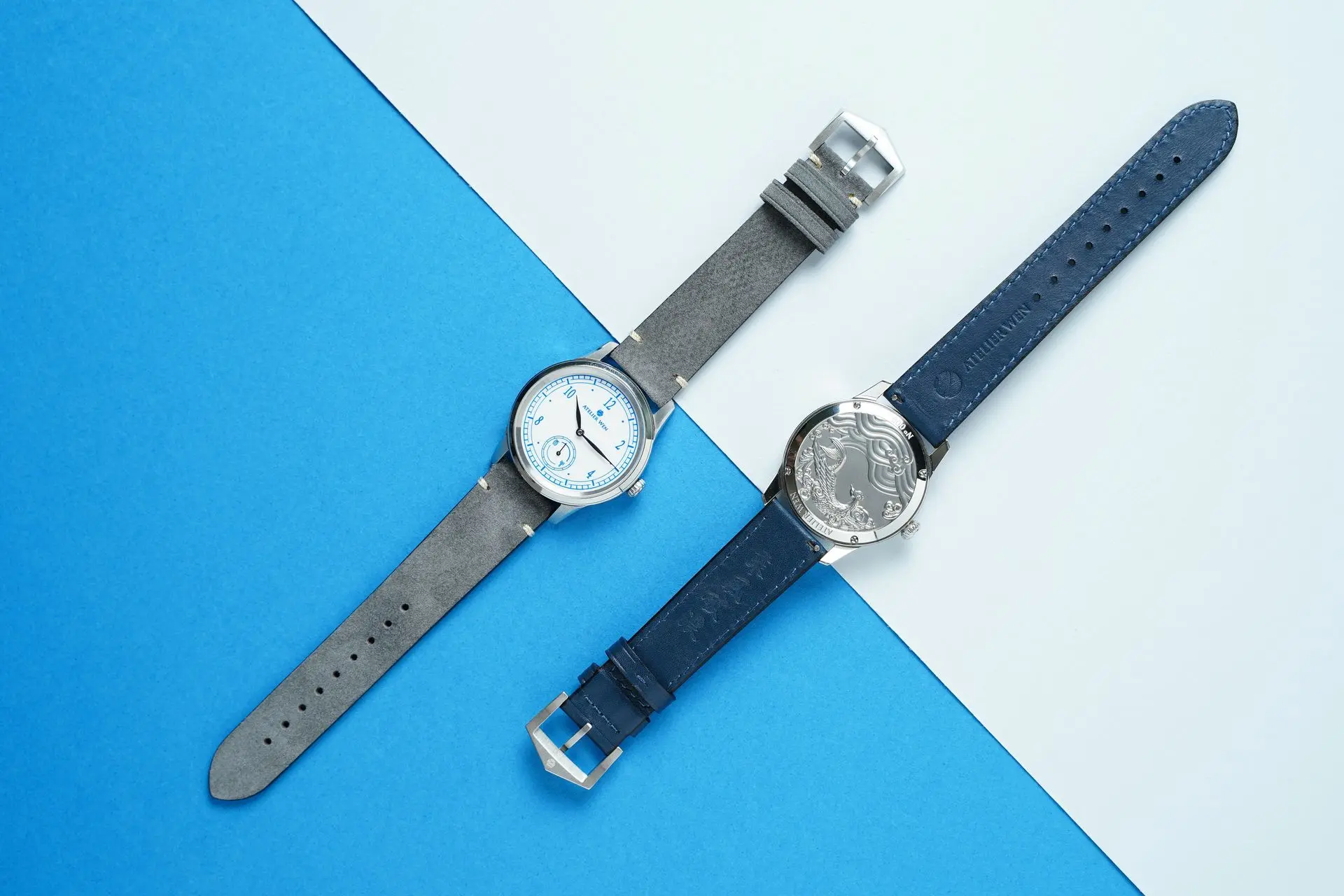 Atelier Wen Chinese watch brand timepiece with blue leather strap and engraved caseback on blue background