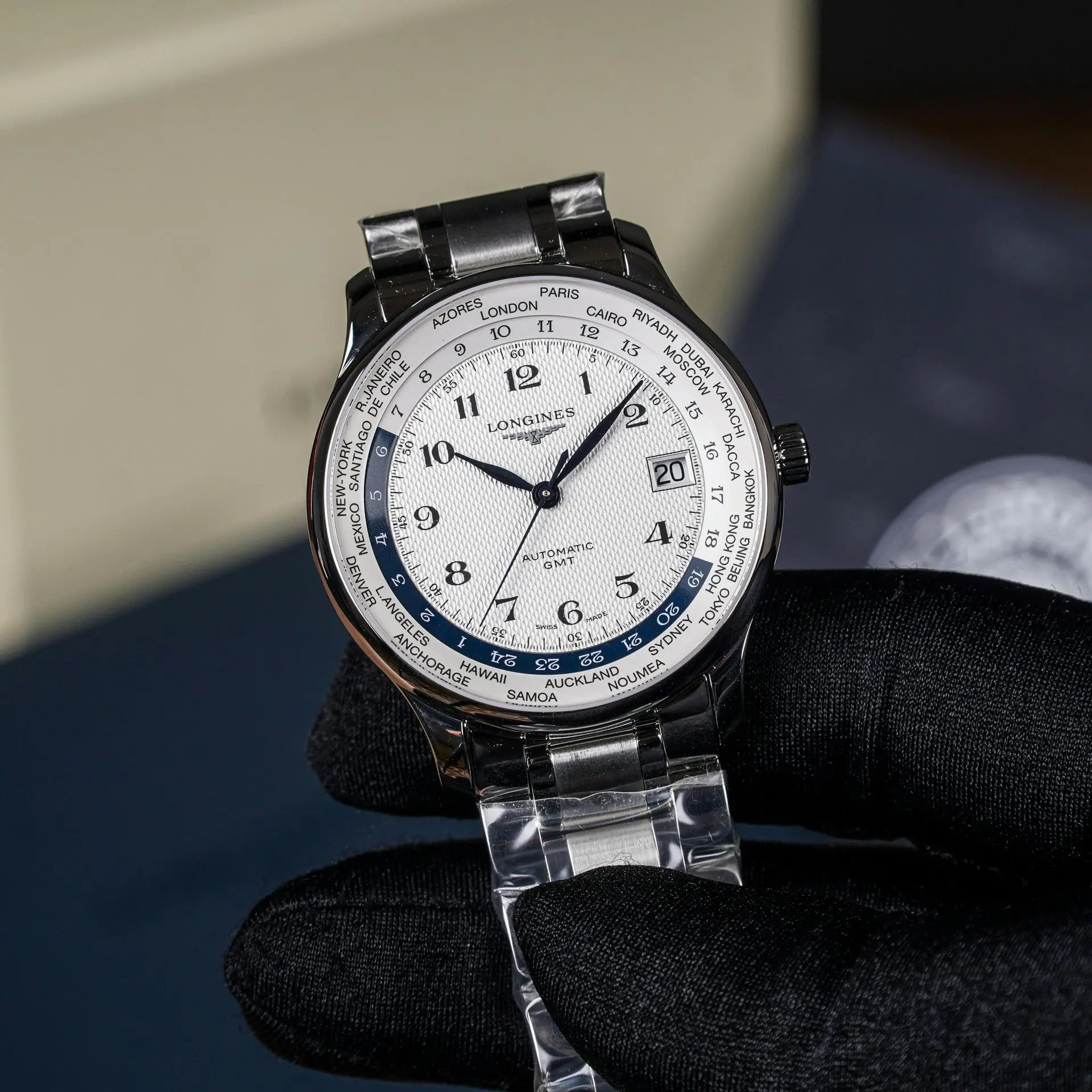 42mm Longines Master Collection GMT with silver dial, city ring, 24-hour scale, and stainless steel bracelet