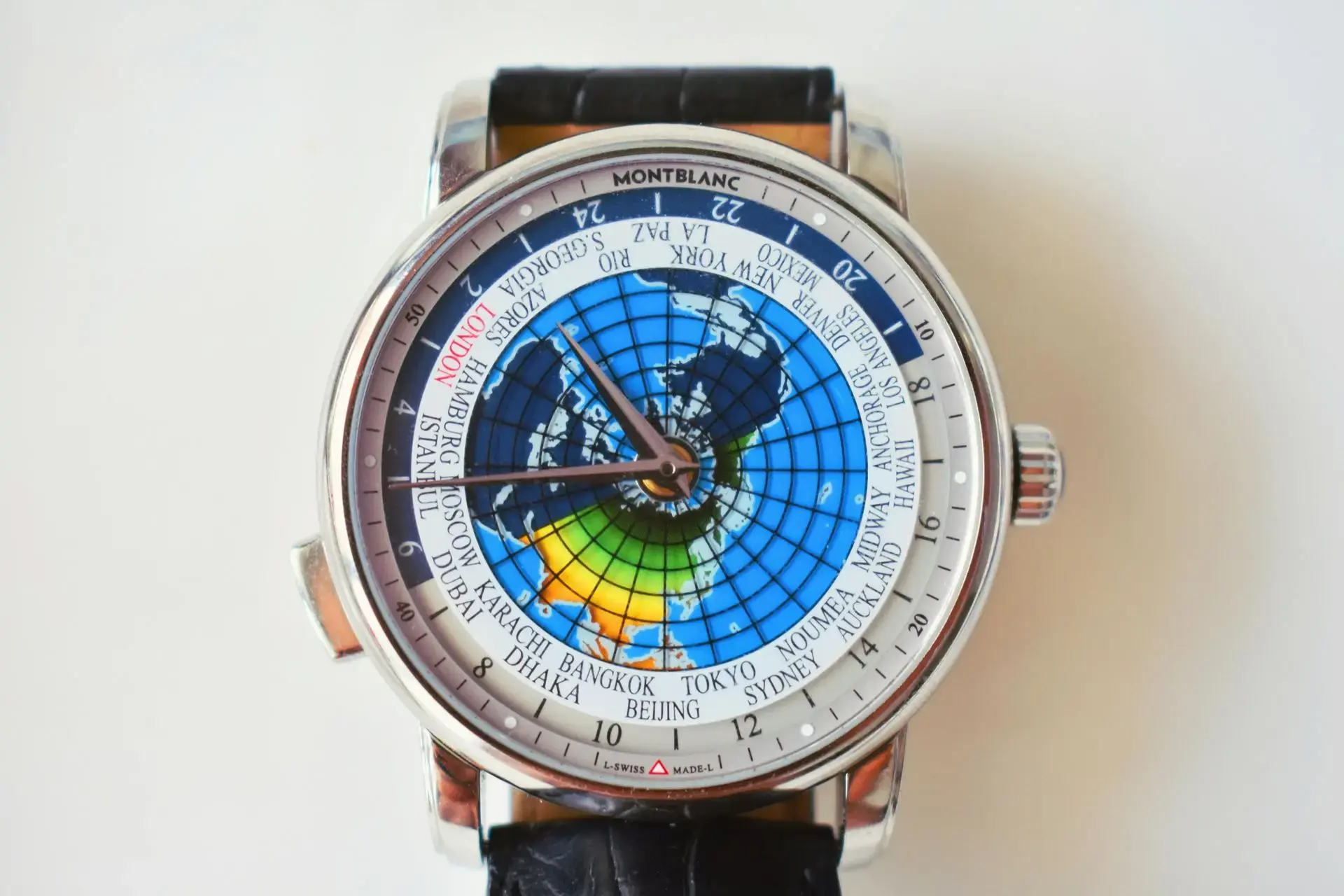 Montblanc worldtimer watch with global map dial and city time zones display