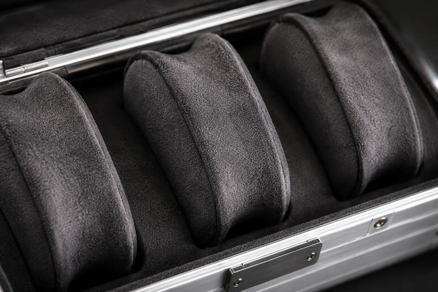 Microfiber watch cushions inside a Rimowa-inspired luxury aluminum watch travel case
