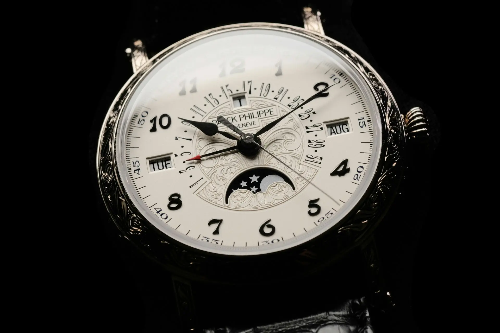 Luxury watch complication featuring moonphase and calendar display