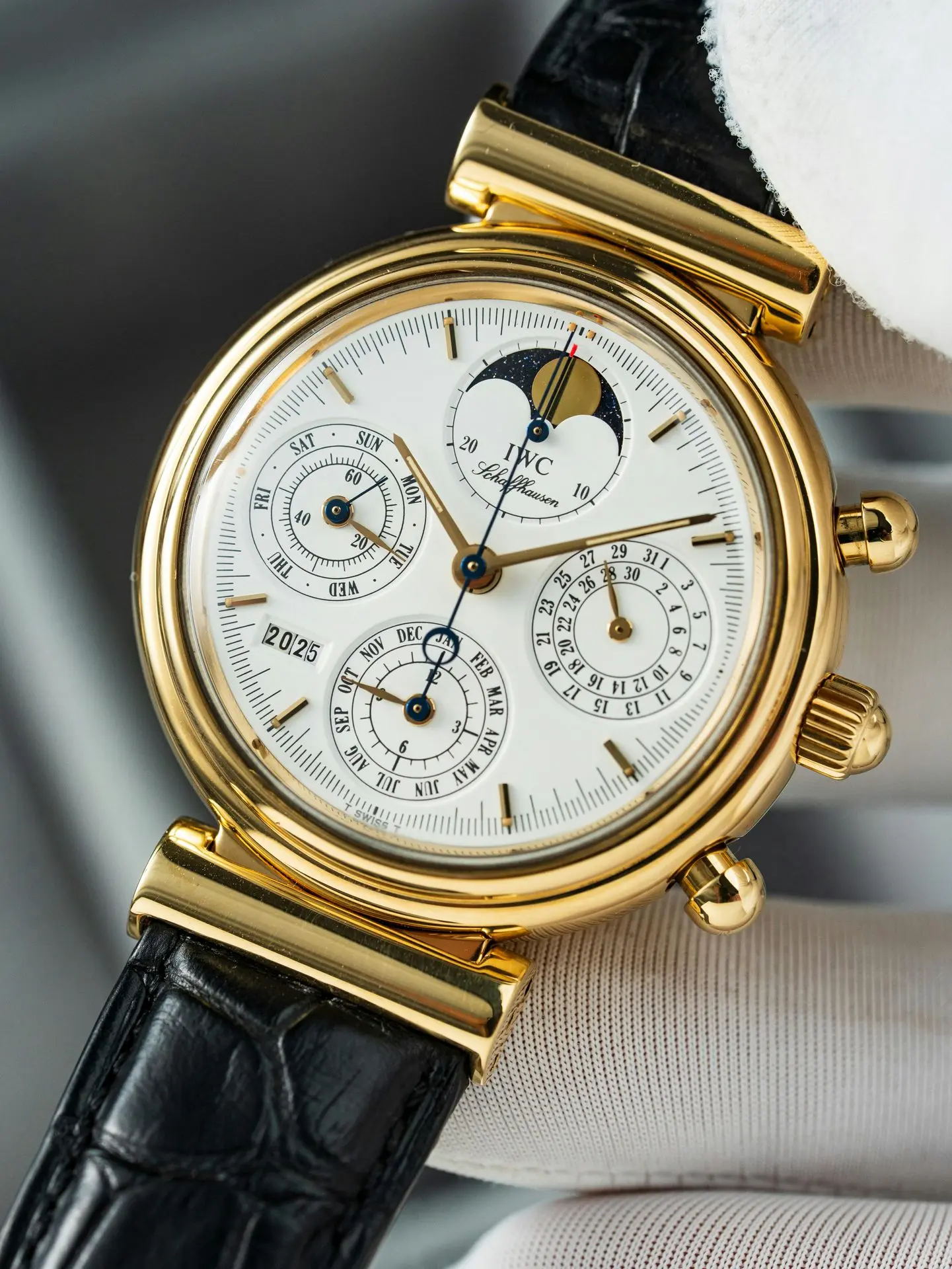 Luxury perpetual calendar watch complication with moonphase and date display