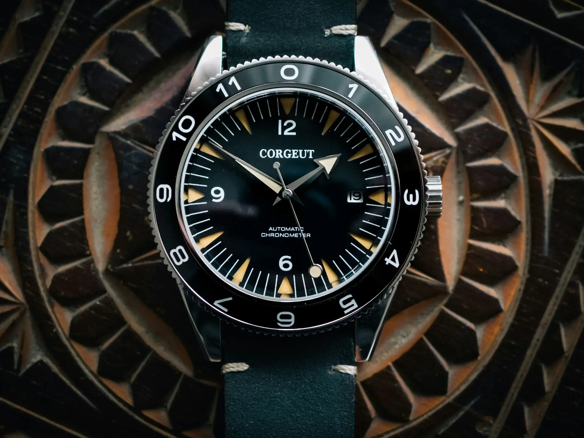 Automatic mechanical watch shown in a watch service article about self-winding movements and maintenance.