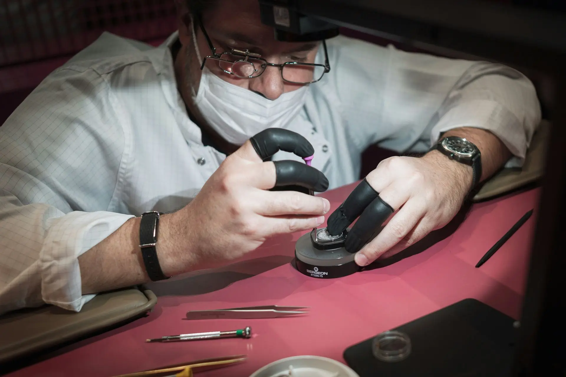 Common Signs Your Automatic Watch Needs Service Professional watchmaker diagnosing an automatic watch that shows signs requiring watch service and maintenance.