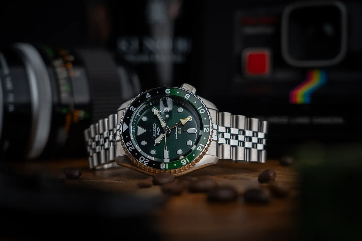Minimalist watch collection featuring a GMT watch with a stainless steel bracelet for travel