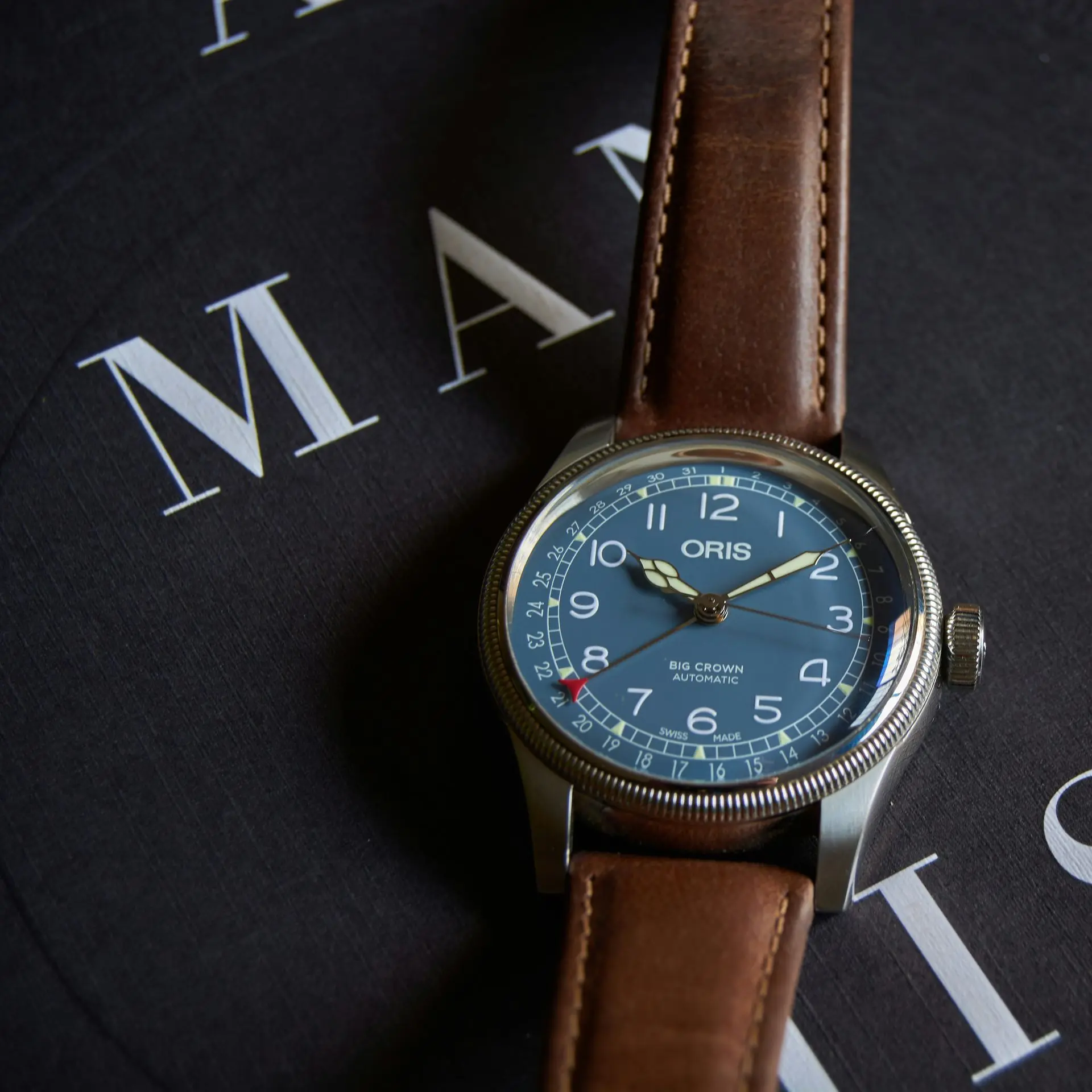Leather Strap Watch for a Minimalist Watch Collection Minimalist watch collection featuring a classic brown leather strap watch with a blue dial