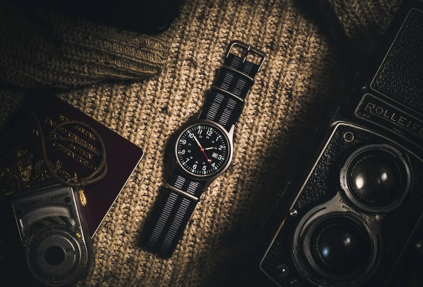 Minimalist watch collection featuring a field watch with a black NATO strap