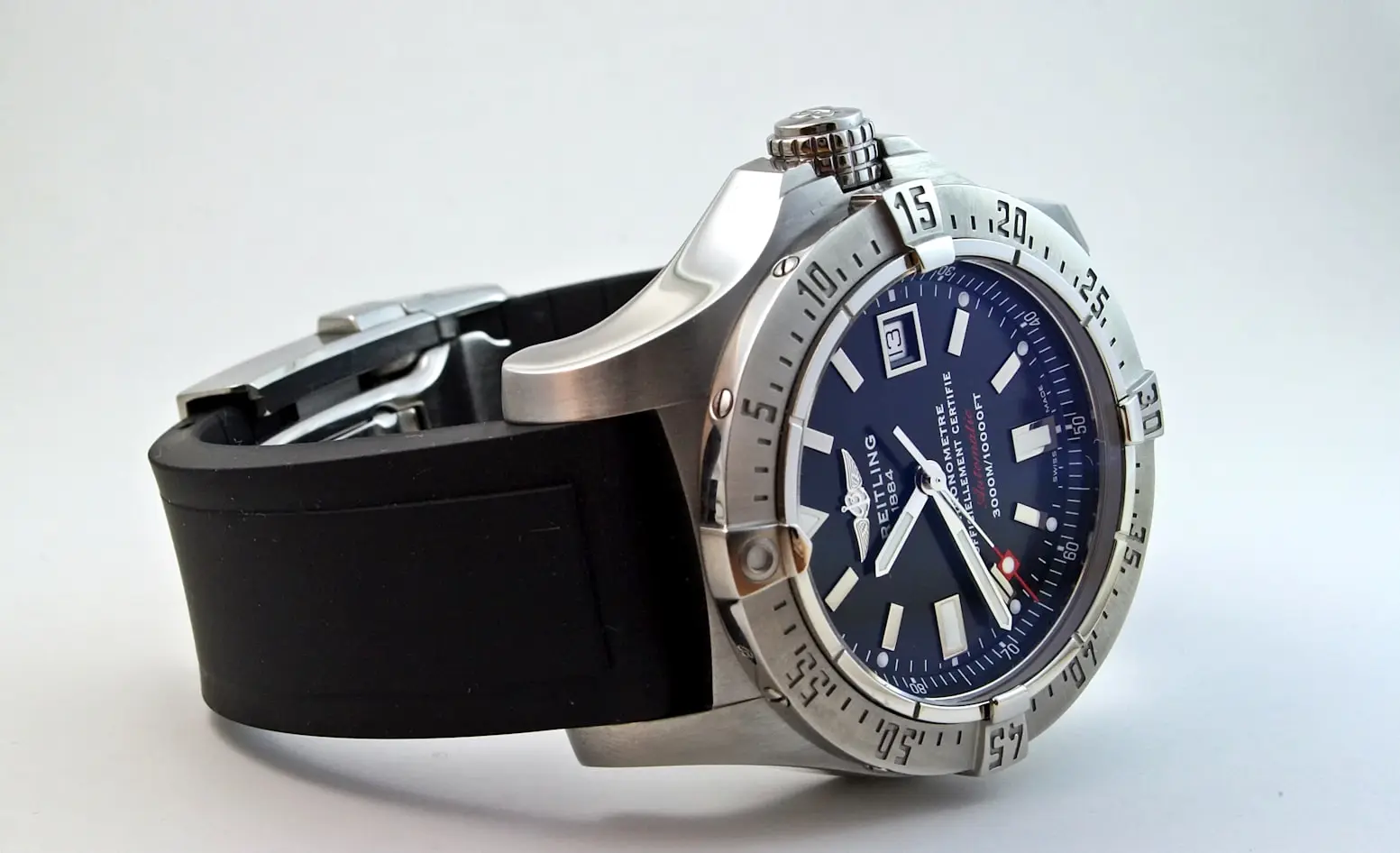 Minimalist watch collection featuring a dive watch with a durable black rubber strap