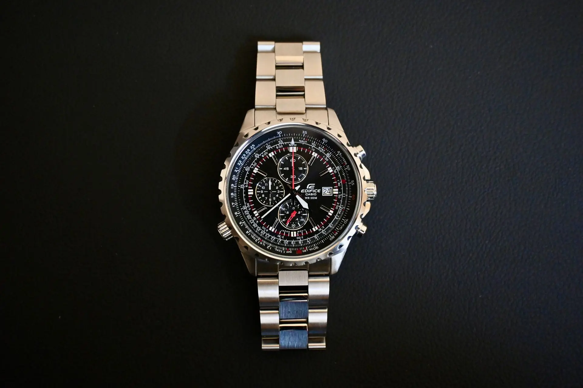 Aviation Chronograph Watch with Slide-Rule Bezel Aviation chronograph watch with multiple subdials and a detailed slide-rule bezel