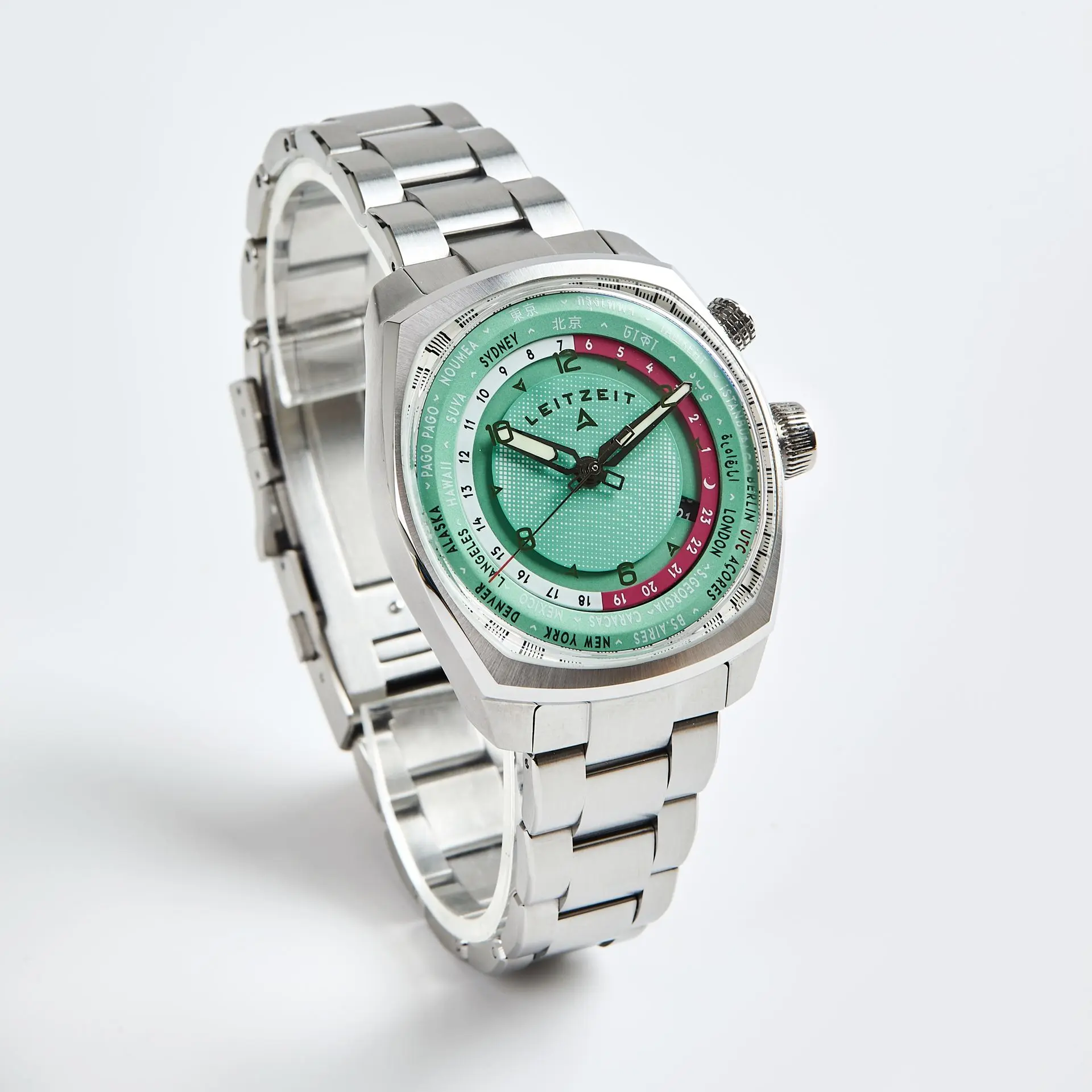 Axis Mundi Worldtimer watch with green dial and stainless steel bracelet