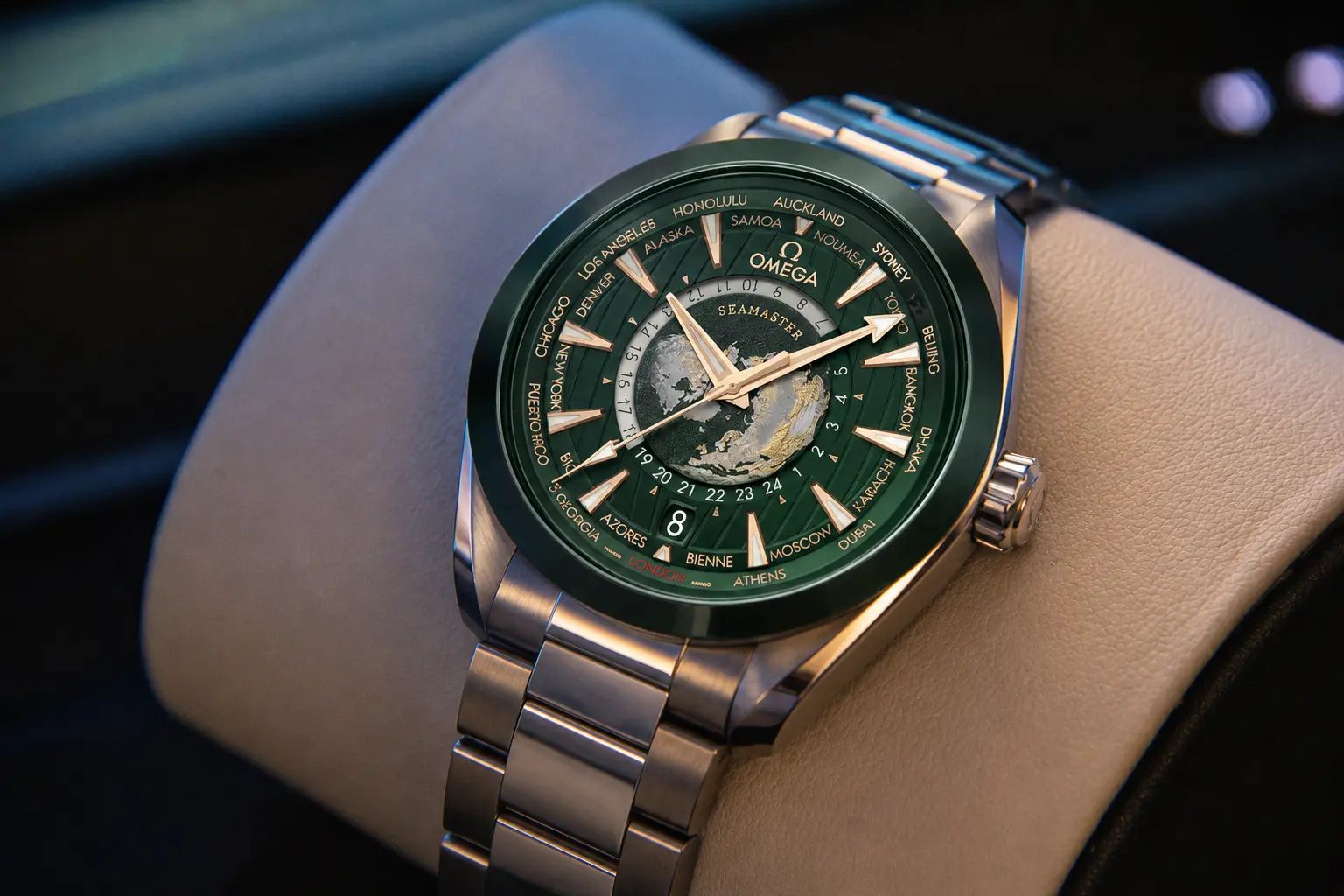 Omega Aqua Terra Worldtimer Watch Around $10,000 Omega Aqua Terra Worldtimer watch on a leather watch cushion