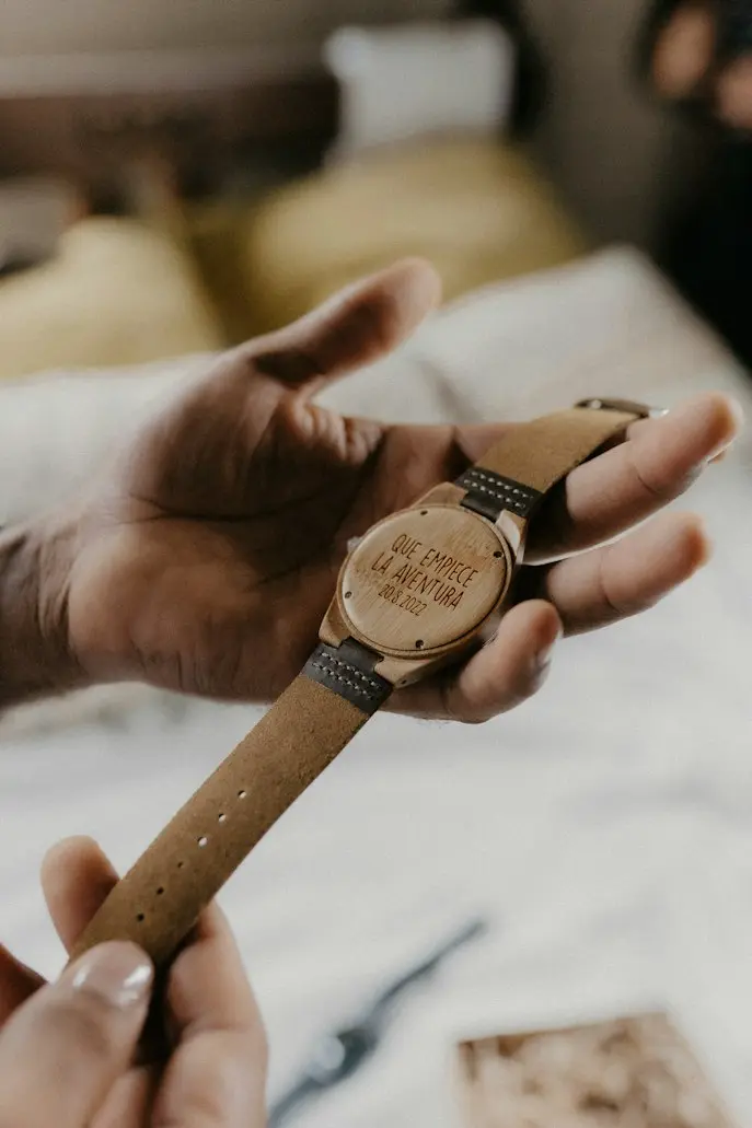Personalized engraved watch being presented as a commemorative gift